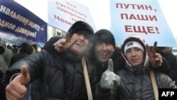 Сторонники Владимира Путина на митинге в его поддержку, прошедшем 4 февраля 2012 г.